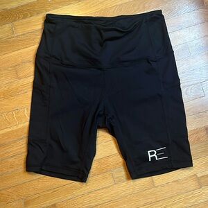 Runner’s Empire black running shorts with lots of pockets! Size Small.